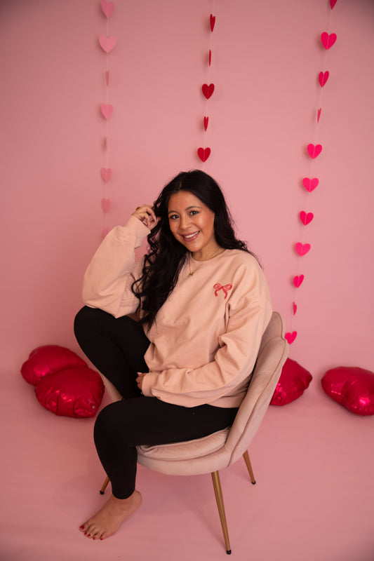 ‘She is you’ crewneck